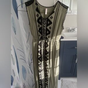 Long dress green and black size small. Brand Xhiliration